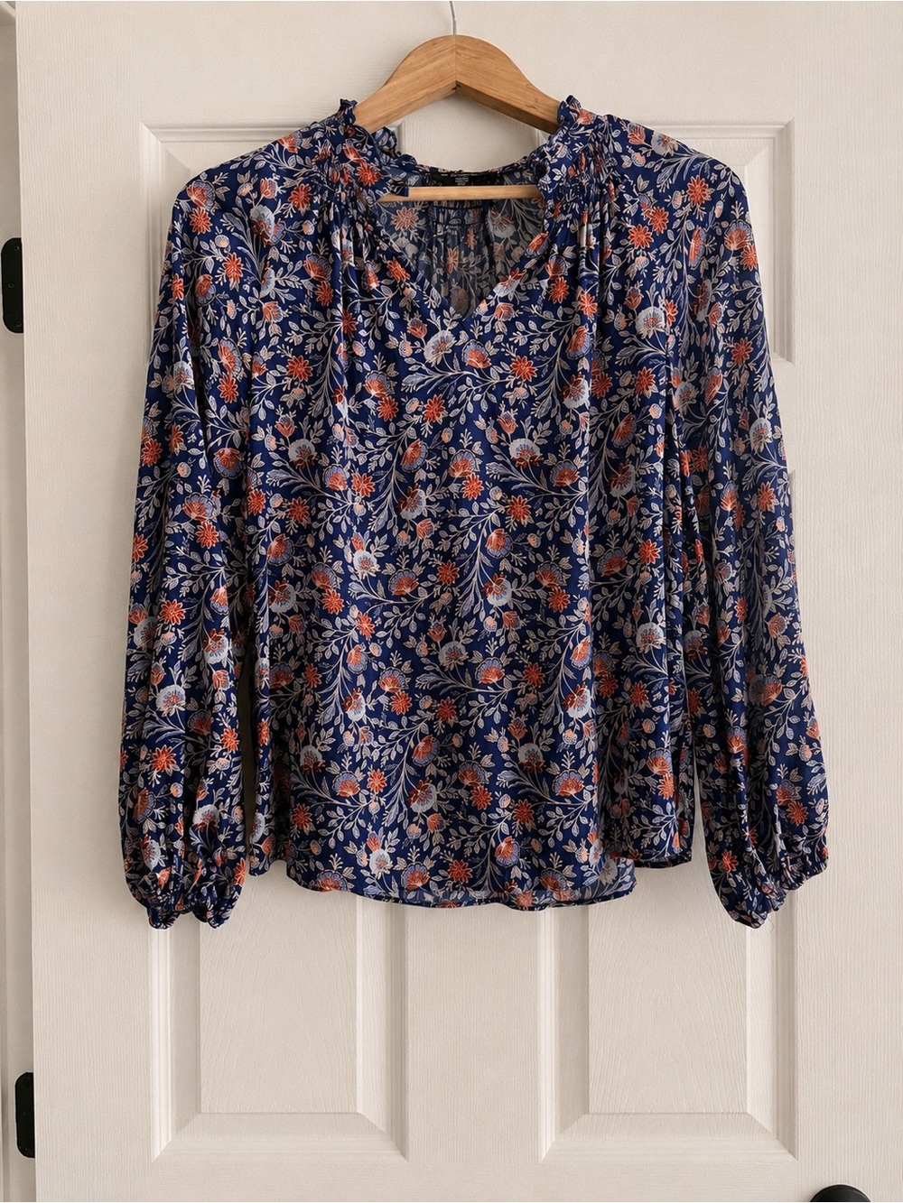Grace Navy Floral Ruffle-Neck Blouse with Coral Accents